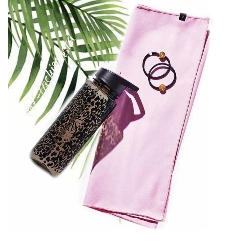 Pink Towel with Leopard Print Bottle and Hair Ties